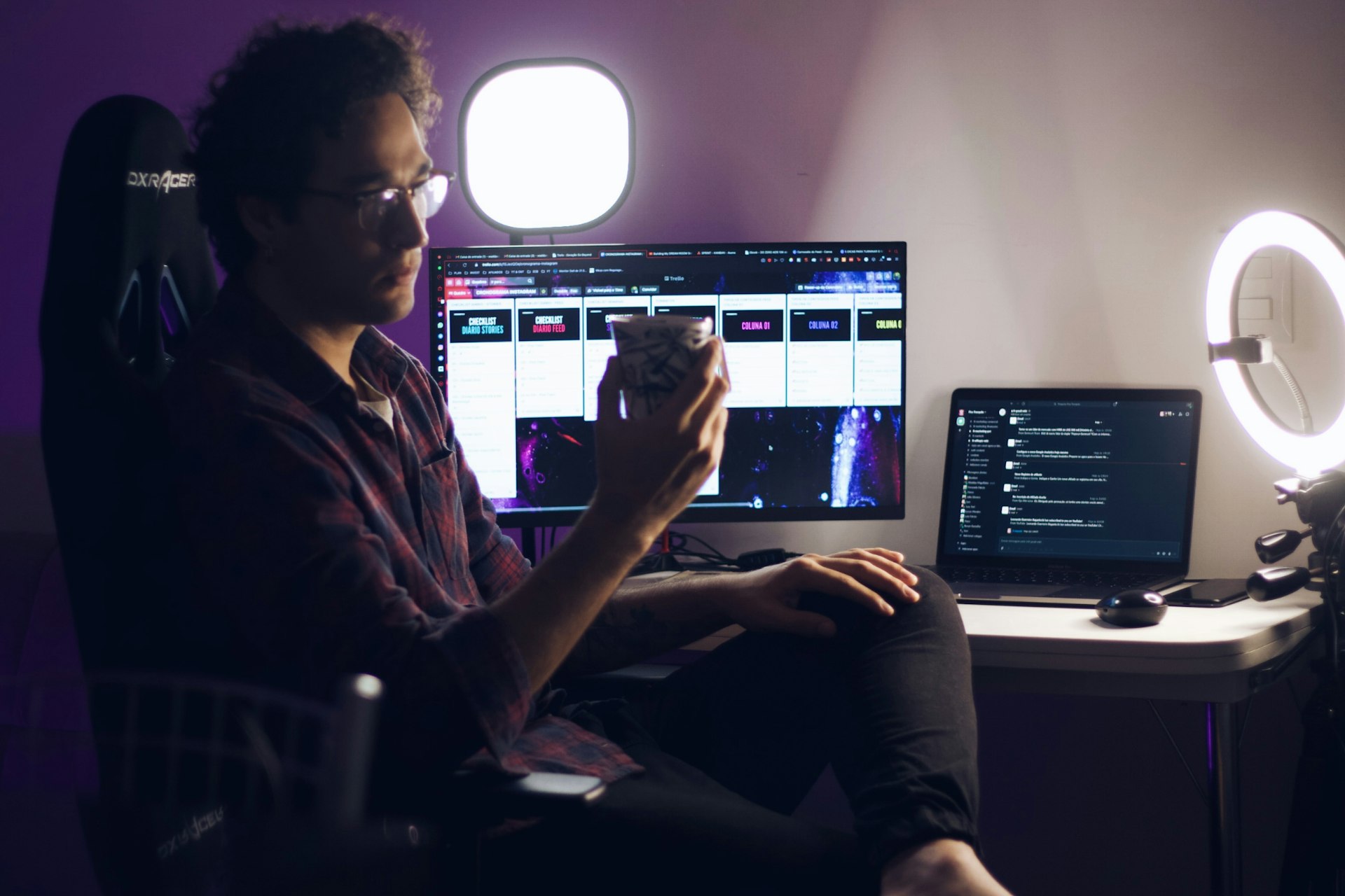 man in brown button up shirt sitting on chair in front of computer